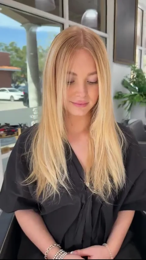 Before: blonde hair with lighter, shoulder-length ends